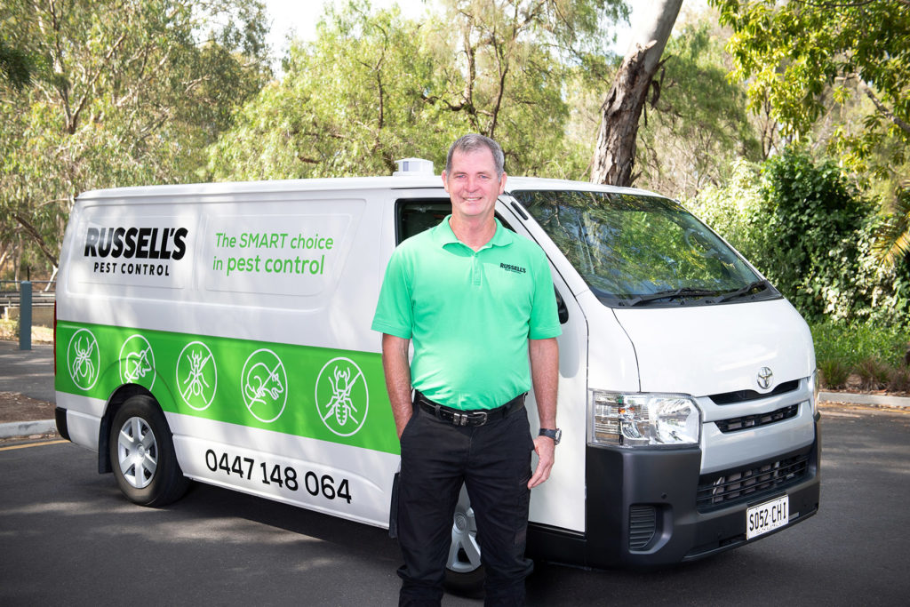 Russell's Pest Control with van
